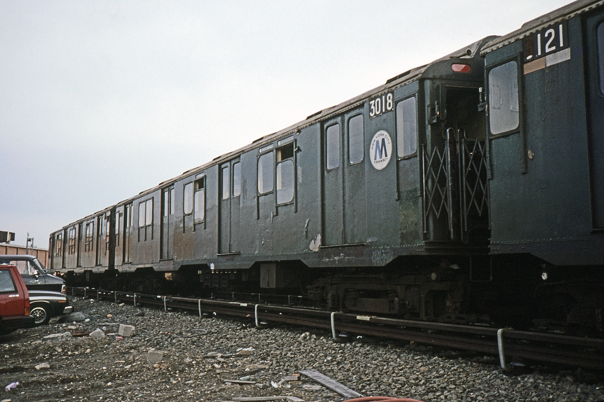 (490k, 1200x800)<br><b>Country:</b> United States<br><b>City:</b> New York<br><b>System:</b> New York City Transit<br><b>Location:</b> Coney Island Yard<br><b>Car:</b> R-10 (American Car & Foundry, 1948) 3121 <br><b>Photo by:</b> Glenn L. Rowe<br><b>Collection of:</b> David Pirmann<br><b>Date:</b> 4/10/1990<br><b>Notes:</b> With R10 3018<br><b>Viewed (this week/total):</b> 2 / 5478