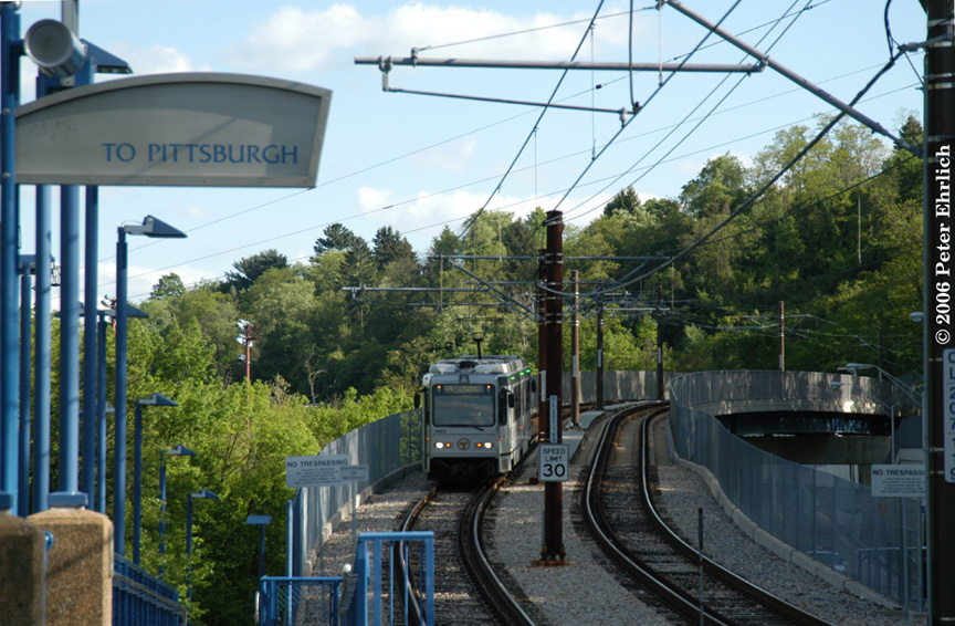 (234k, 864x566)<br><b>Country:</b> United States<br><b>City:</b> Pittsburgh, PA<br><b>System:</b> PAT<br><b>Line:</b> PAT Overbrook Line<br><b>Location:</b> South Bank<br><b>Car:</b> Pittsburgh CAF LRV 4303 <br><b>Photo by:</b> Peter Ehrlich<br><b>Date:</b> 5/20/2006<br><b>Notes:</b> Approaching South Bank Station inbound.<br><b>Viewed (this week/total):</b> 2 / 2008